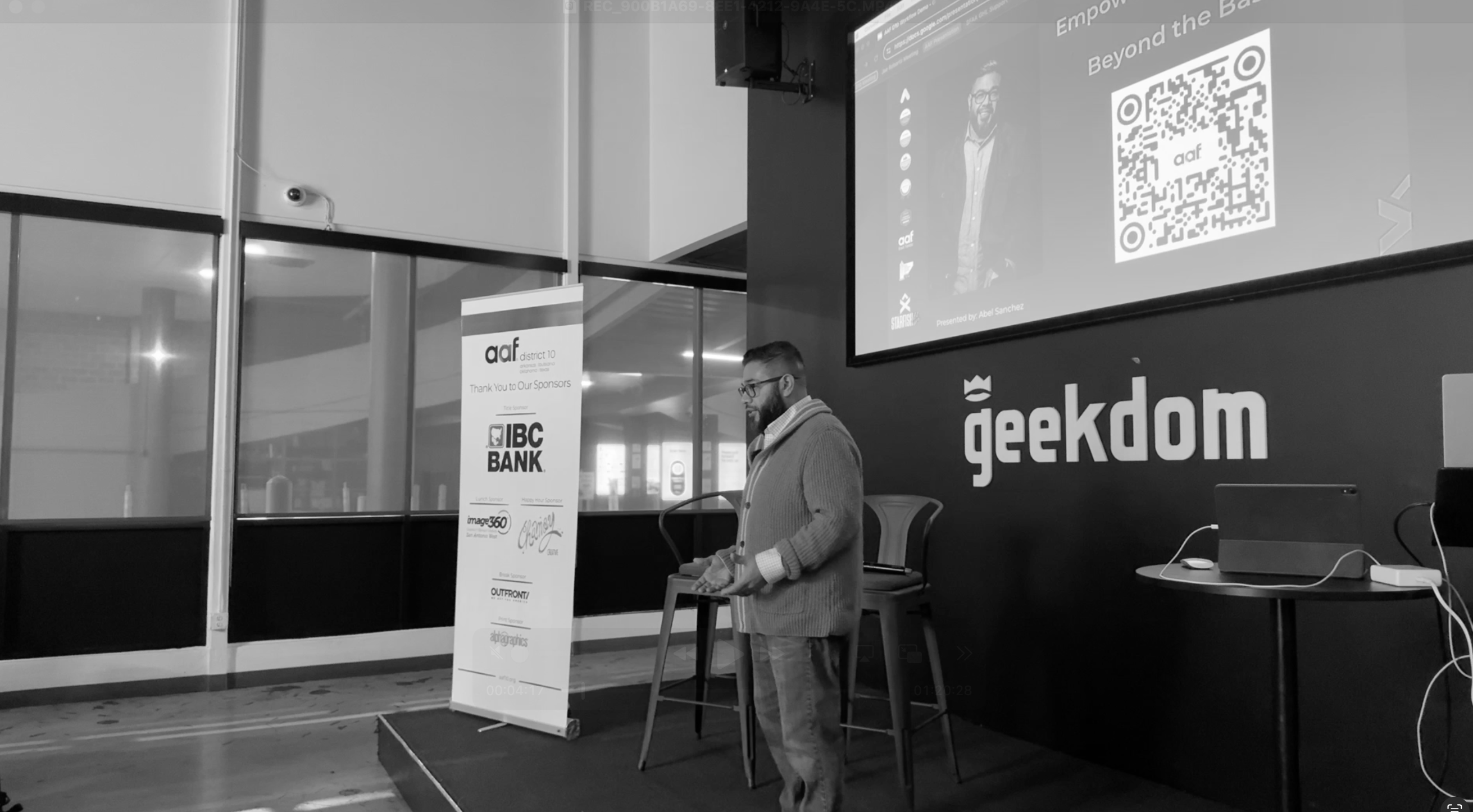 Abel Sanchez speaking on stage